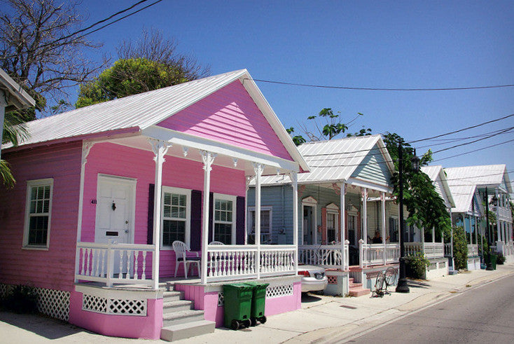 Colorful pink, blue and green conch cottages in Key West, Florida