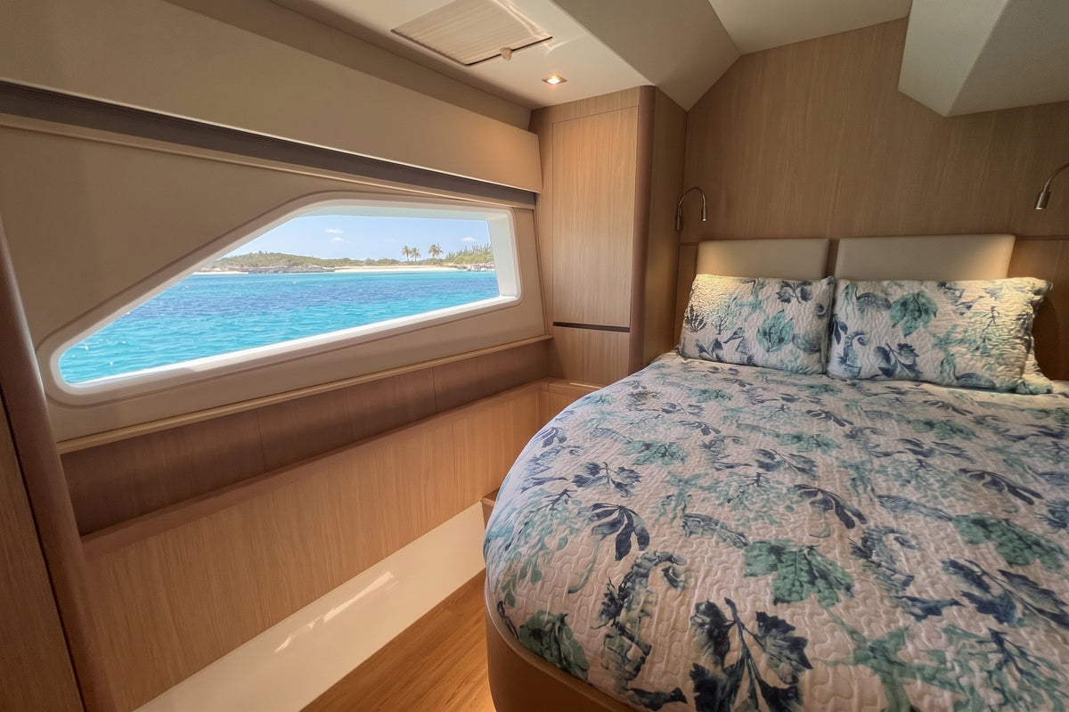 Cabin with hull window and double bed on the 44ft Aquila Let it be 3