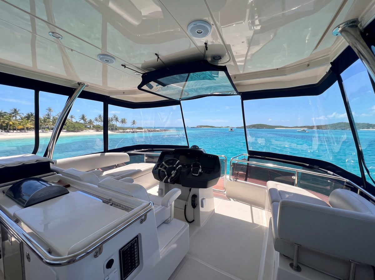 Flybridge helm and sun lounge on Let it be 3, a 44ft Aquila catamaran
