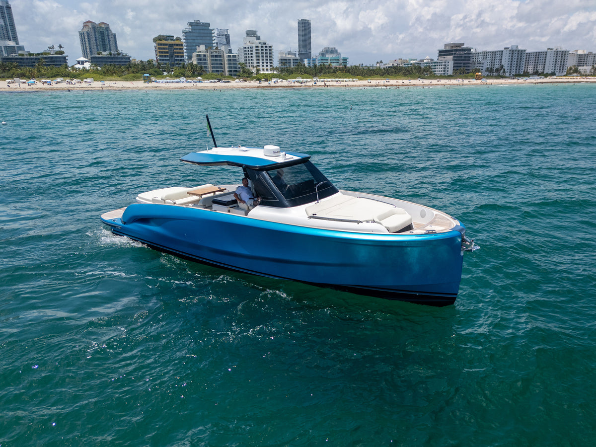 Solaris Power Sport Turismo underway with the Miami Beach skyline behind