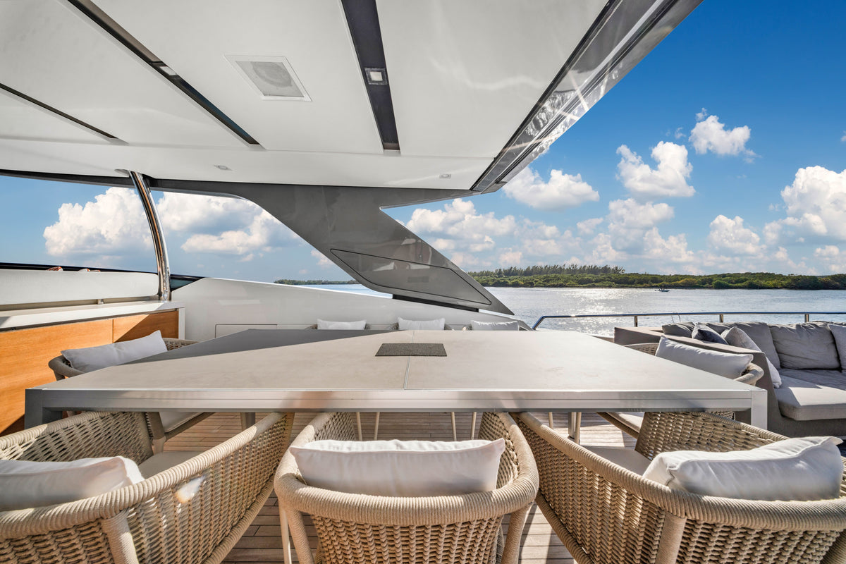 Alfresco dining table set on the flybridge of ASTONISH for lunch underway