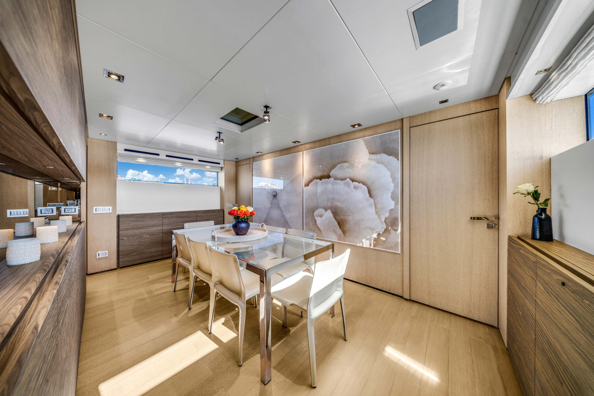 Formal dining room aboard ASTONISH, seating eight beneath the yacht's Sanlorenzo joinery