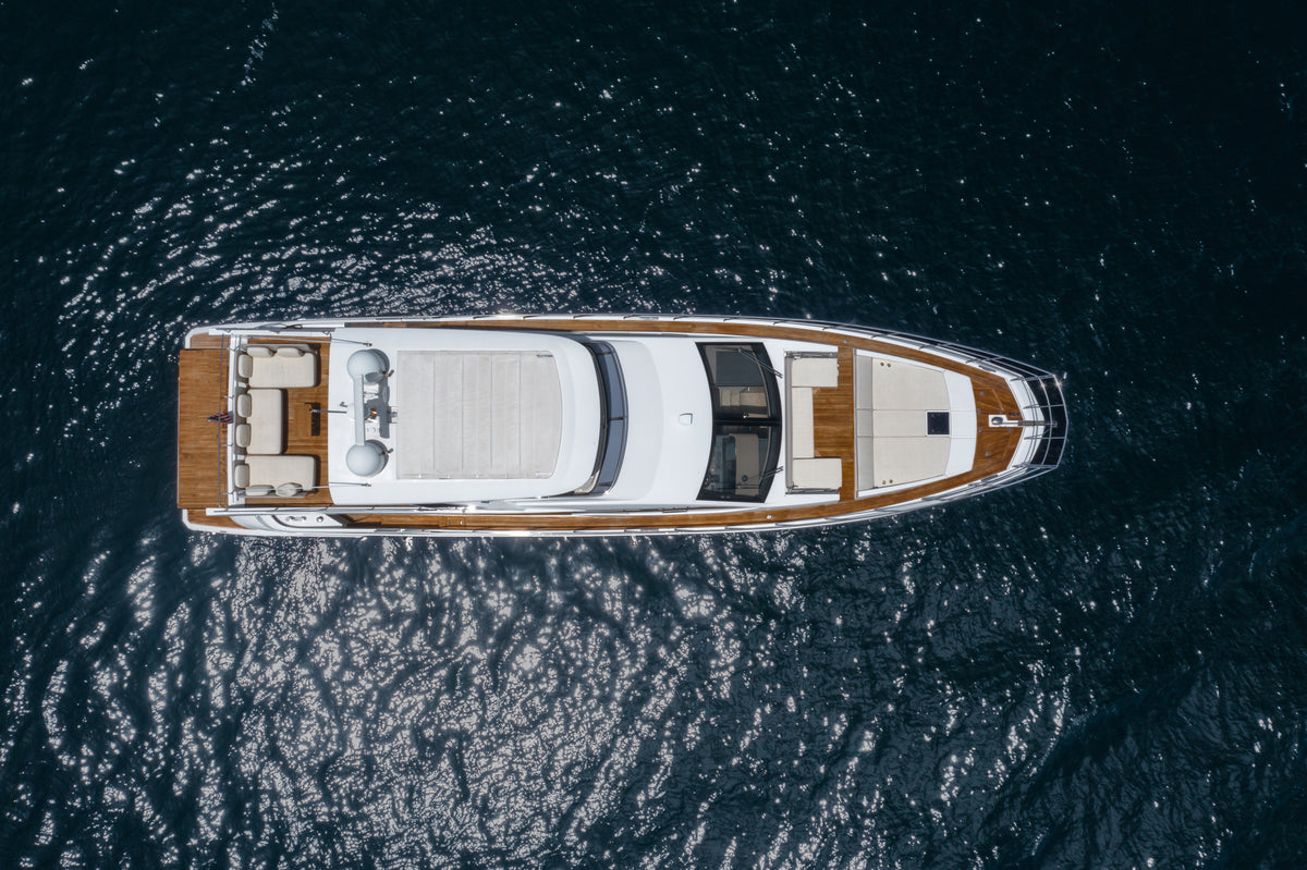 Overhead view of Le Grand Bleu, showing the full deck layout from bow sunpad to swim platform