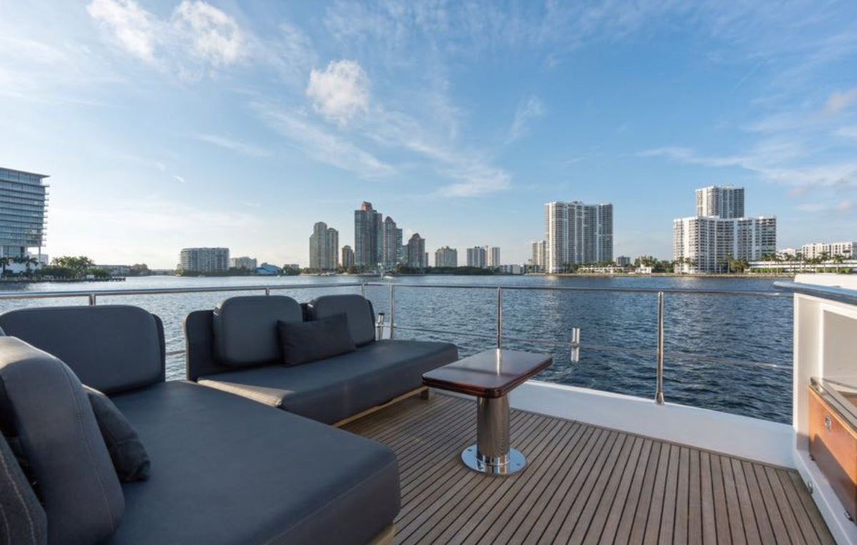 Open aft sun loungers on the Paragon flybridge facing the Miami waterfront