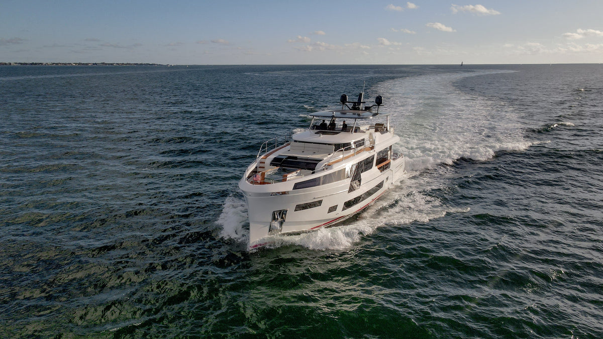Aerial view of the 88ft Sirena SAINT at anchor, bow plunge pool and sun pads in view