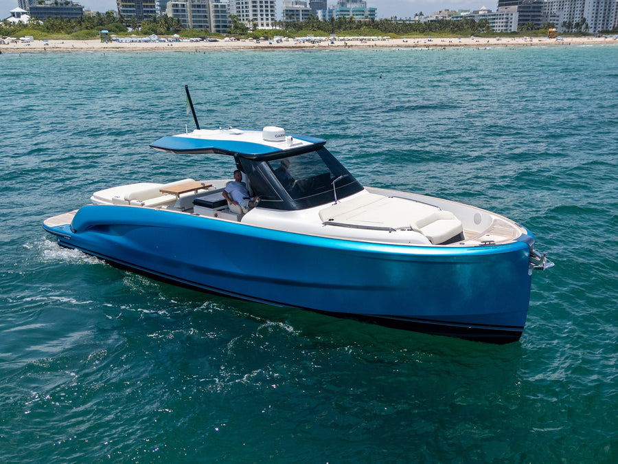 Solaris Power Sport Turismo underway with the Miami Beach skyline behind
