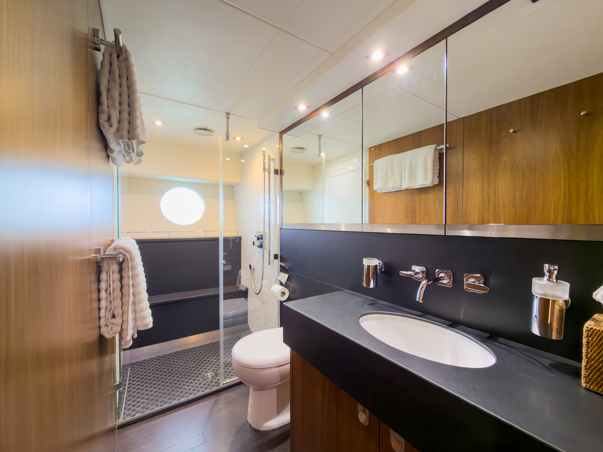 En-suite head with walk-in shower aboard START ME UP