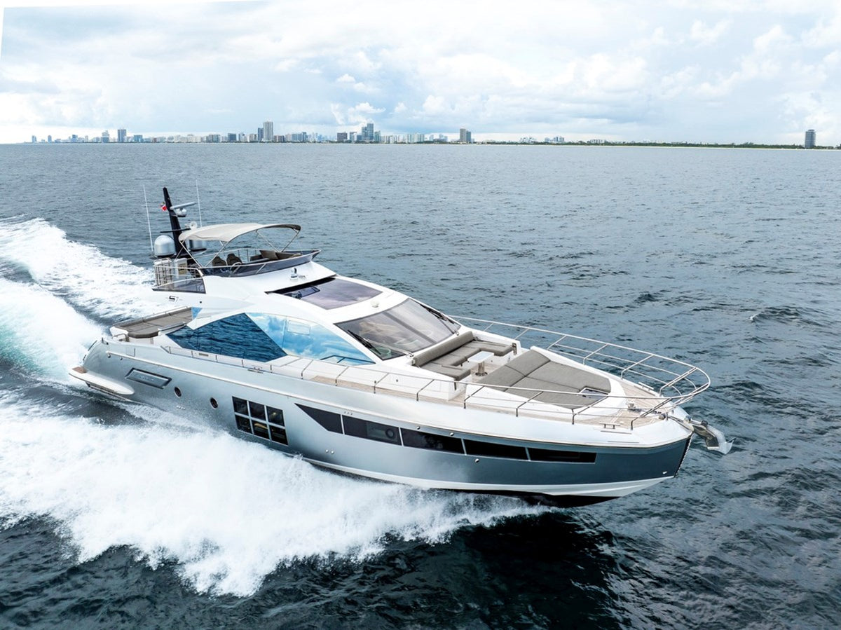 Azimut S7 Water You Doing cruising Biscayne Bay with the Miami skyline behind