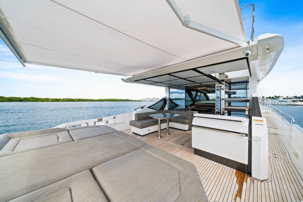 Aft deck sun pad and shaded cockpit on Water You Doing in Miami