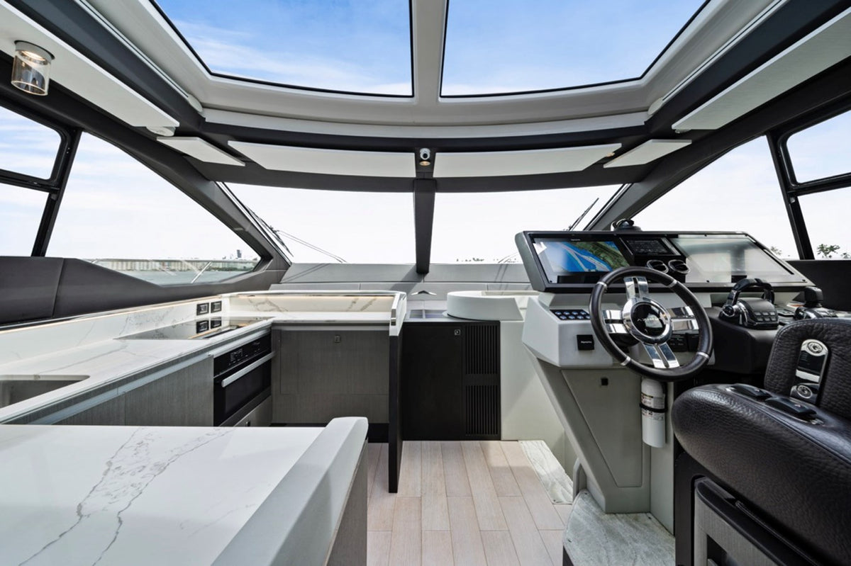 Galley and lower helm on Water You Doing under the sunroof